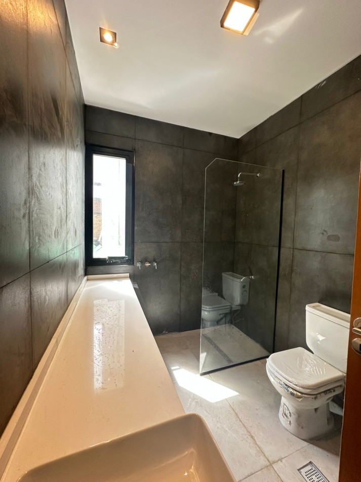 Casa a estrenar en el Country La Reserva 1