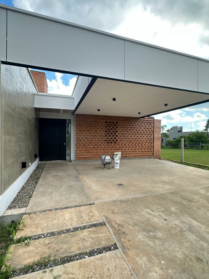 Casa a estrenar en Country La Reserva 1 - Lote A17